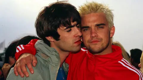 Getty Images Liam Gallagher and Robbie Williams at Glastonbury Festival in 1995