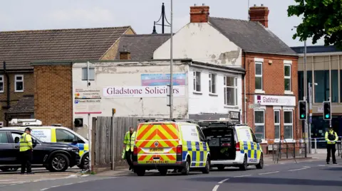 Jacob King/PA Wire The scene in Market Place, Arnold, where a man has suffered life-threatening injuries after a car hit multiple pedestrians in the town centre. A number of people were struck by the vehicle, with one of the victims sustaining life-threatening injuries. 