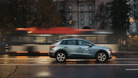 Spark passes through a spark electric car a tram