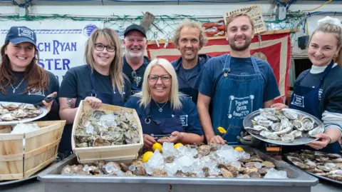 Pete Robinson Participants at the Stranraer Oyster Festival showing off their shellfish