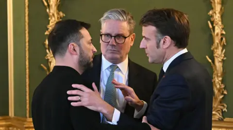 Ukraine's President Volodymyr Zelensky, Prime Minister Sir Keir Starmer and France's President Emmanuel Macron hold a meeting during a Leaders' Summit on the situation in Ukraine at Lancaster House, London. Picture date: Sunday 2 March 2025