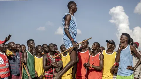 A Maasai athlete competes in the men's traditional Maasai jumping competition