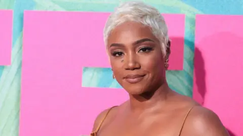 Getty Images An image of Tiffany Haddish on the red carpet with blonde hair