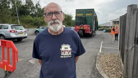 Jo Burn/BBC Resident Max Briccolani at bottled water station in Whitstable.