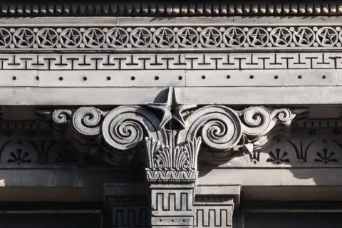 Nick Haynes Close up of the intricate design on the sandstone, featuring geometric, swirled and star motifs.