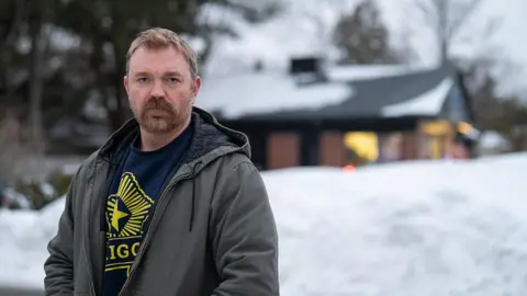 Bloomberg via Getty Images Graham Platner in an olive green jacket 