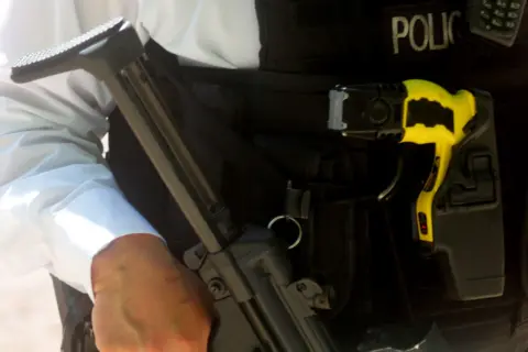 Getty Images Close-up of a British armed police officer in London, England