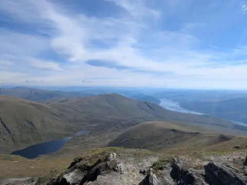 Emma Jones A view from the top of Ben Lawers, with hills, rivers and clouds all visible