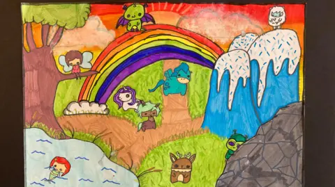 YorKAOS Mythical Land, a colourful painting showing a grassy landscape, with a rainbow, fairies and dragons.