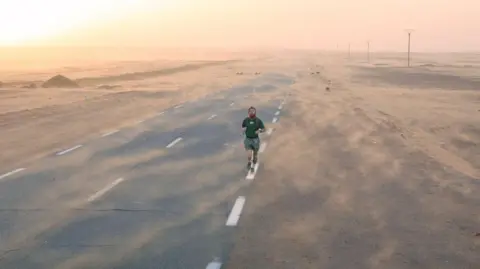 GUUS VAN VEEN Russell Cook running in northern Africa