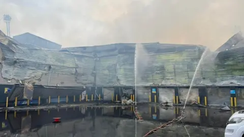 Surrey Fire & Rescue Service Fire at a storage warehouse