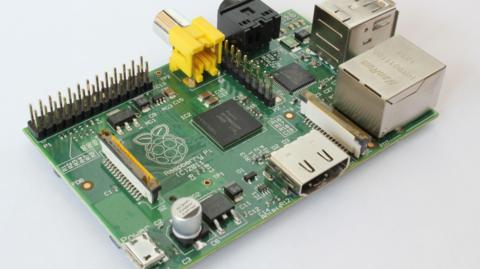 A tiny Raspberry Pi computer, about the size of a credit card 