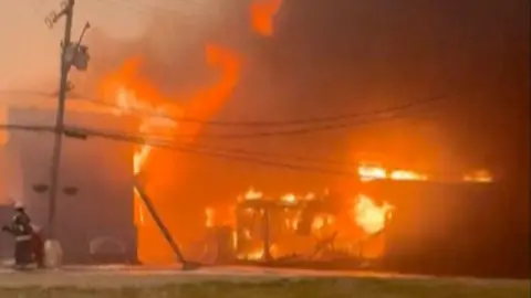 Building is on fire due to Canada's wildfires.