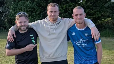 Turner Family James Turner in the centre of the picture wearing a grey hooded top has his arms around friends Dan Peacock and Spencer Cooper who are wearing dark blue sports tops