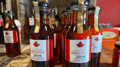 Getty Images Canadian maple syrup bottles