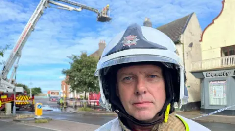 Andrew Turner/BBC Chris Harding-Hook, from the fire service