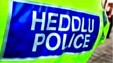 A woman died in police custody in Caernarfon on Friday