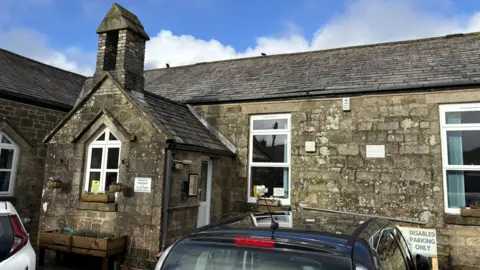 an old Granite school building that now houses a community centre 