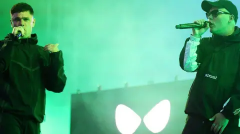 Kneecap performing live at Wide Awake festival