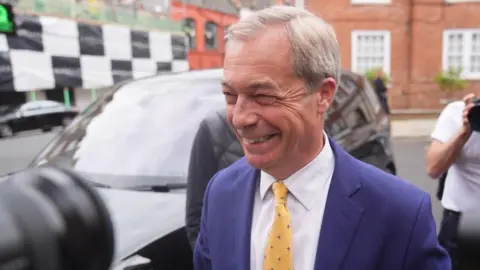 PA Media Nigel Farage arrives at Trump fundraiser in London