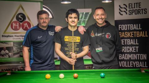Louis Axcell, curriculum team leader for sport at The Sheffield College, with snooker player Reece Matin and Stephen Harrison MBE