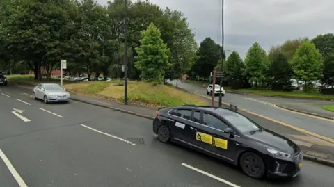Google Streetview image of a busy V-shaped intersection in Wigan. Four cars - which were not involved in the incident - can be seen in the photograph