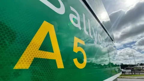 BBC Green sign on the A5 road