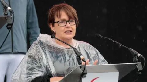 Getty Baroness Tanni Grey-Thompson speaking during the Paralympic Flame Lighting Ceremony at Stoke Mandeville Stadium on 24 August