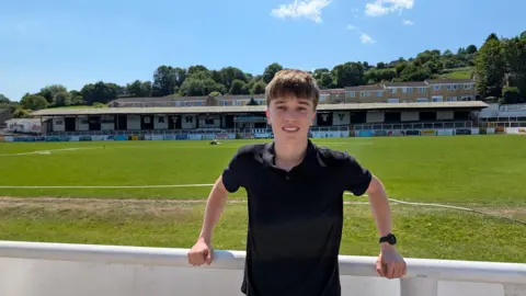 15 year old Bath City fan George ran a marathon to help raise money towards Zac's surgeries 