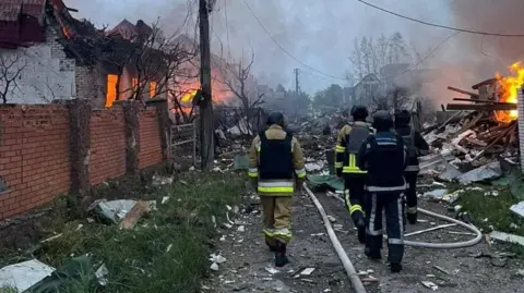 Emergency services crews deployed to tackle blazes in the Kyiv region after overnight Russian aerial attacks. Photo: 25 May 2025