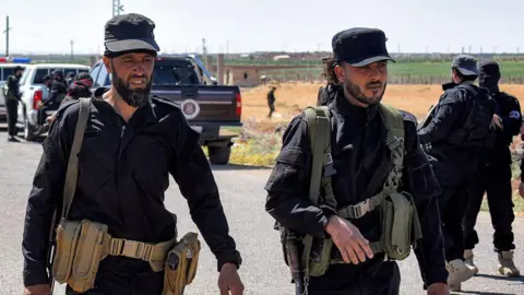 Syrian security forces deploy in Suweida, in southern Syria, on 14 July 2025