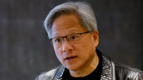 Nvidia’s CEO Jensen Huang attends a media roundtable meeting in Singapore.
