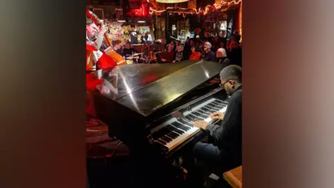 The Bear Club pianist and bassist at The Bear Club