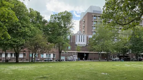 A still picture of parade gardens overlooking Jersey's general hospital