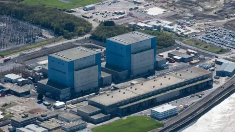 Getty Images Hinkley Point A is seen from above with two main block buildings rising above the rest of the site.