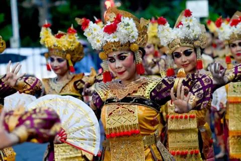 SONNY TUMBELAKA/AFP Balinese accepted   dancers execute  during the creation   of releasing the prima   2024, welcoming the prima   2025 a New Year's Eve solemnisation  successful  Denpasar connected  Indonesia's edifice   land  of Bali connected  December 31, 2024.