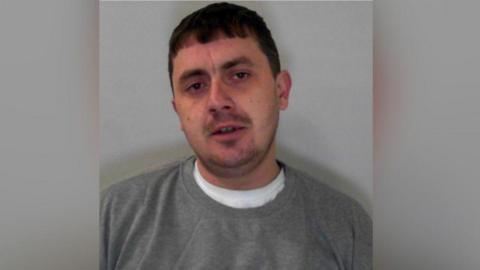Police custody image of Alex Balcombe who has been jailed for 20 months
