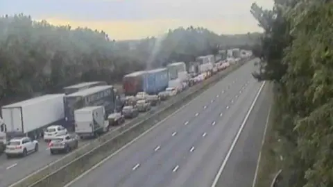 National Highways Traffic queueing on the M1 southbound in Leicestershire.
