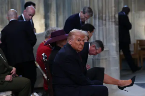 Anna Moneymaker/Getty Images S First Lady Melania Trump and US President Donald Trump arrive at St. George’s Chapel during the State visit by the President of the United States of America at Windsor Castle on September 17, 2025 in Windsor