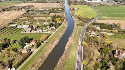 The River Nene which flows through Wisbech next to the A47.