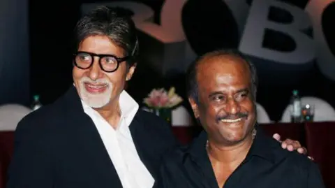 Getty Images Amitabh Bachchan and Rajinikanth at the music launch of the film 'Robot' in Mumbai on August 14, 2010