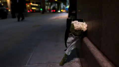 Reuters Flowers lay outside India House in central London