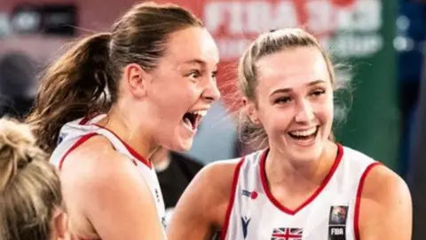 Issy Bunyan and Carys Roy are all smiles as they celebrate while playing for Great Britain