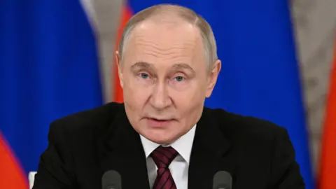 Russian President Vladimir Putin gives a statement to the media at the Kremlin in Moscow