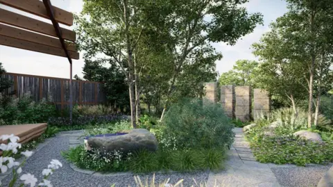 The complete garden while at the Chelsea Flower Show. It shows a modern garden with lots of green shrubbery, a gravel path, large rocks, some white flowers and a bench. 