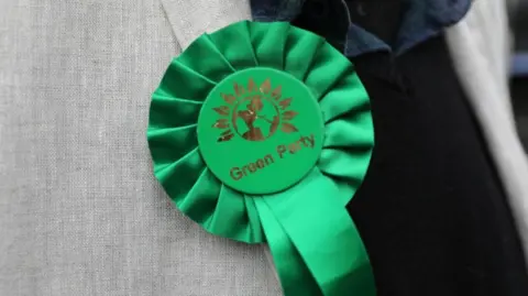 PA Media A Rosette Green Party