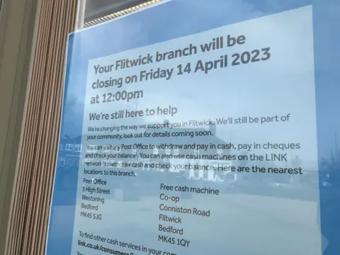 Sam Read/BBC A sign at Barclays bank, Flitwick, Bedfordshire