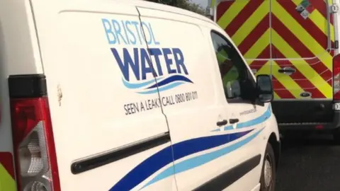 A Bristol Water van. It is white with the company's blue logo printed on the side