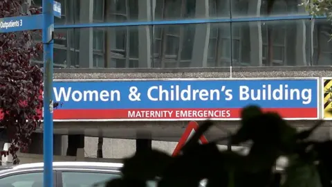 PA Media Exterior of Chester's neonatal unit with blue sign above entrance saying Women and Children's Building - maternity emergencies.