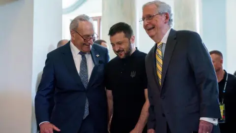 EPA US Senate Majority Leader Chuck Schumer, US Senate Minority Leader Mitch McConnell and Ukraine President Volodymyr Zelensky